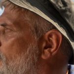 Toughness - Elderly Man Wearing Hat