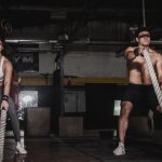 Workouts - Man And Woman Holding Battle Ropes